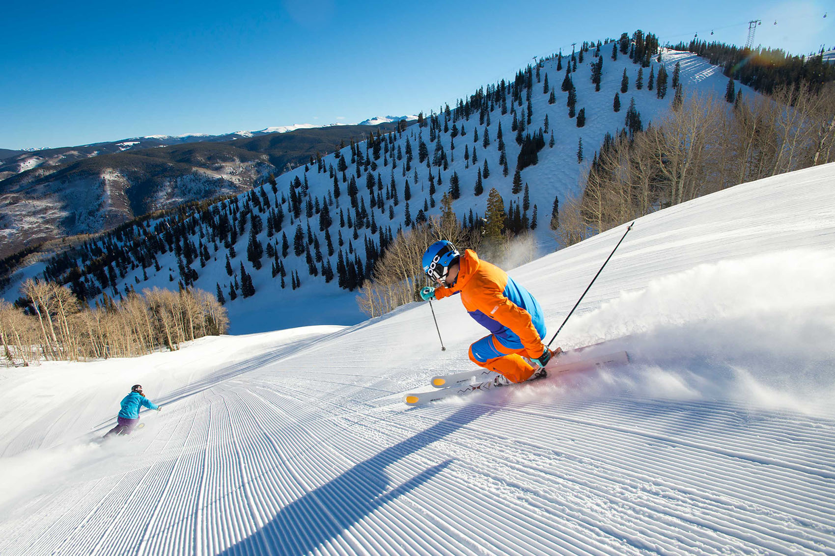 skiers at aspen snowmass